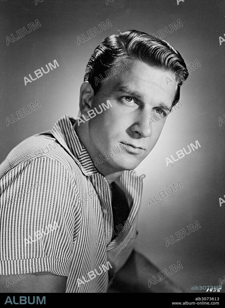 LESLIE NIELSEN en PLANETA PROHIBIDO, 1956 (FORBIDDEN PLANET), dirigida por FRED M. WILCOX. Copyright M.G.M.