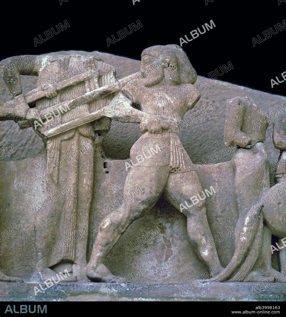 Sculpture from the pediment of the Siphnian treasury. Apollo and Artemis prevent Heracles from stealing the Delphic tripod, 6th century BC.
