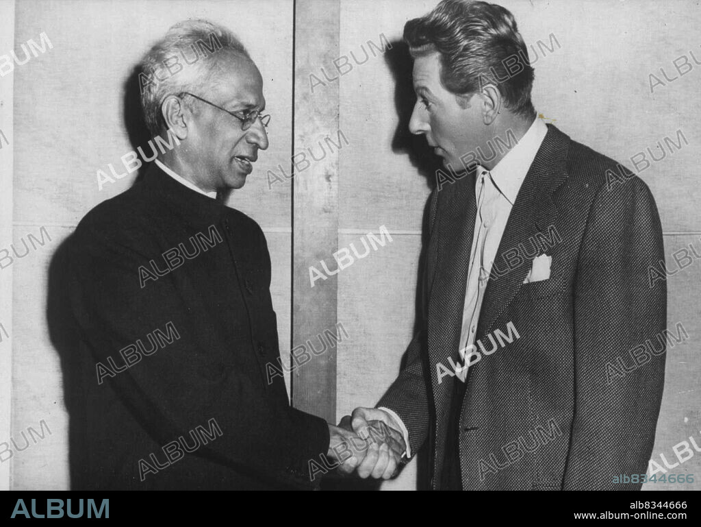 The Vice President of India Meets Danny Kaye - Dr. Radhakrishnan shaking hands with Danny Kaye, the famous screen actor, during his visit.Dr. S. Radhakrishnan, Vice President of India, was the guest at a luncheon given by the Association of Motion Picture Producers in Hollywood during his visit to the U.S.A. After the luncheon the Vice-President made a tour of the Paramount Studios. July 14, 1953.