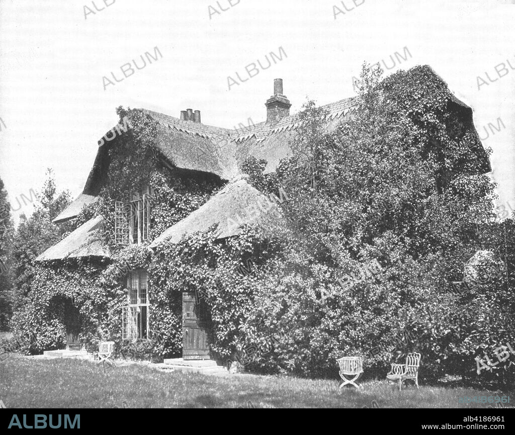 Queen Charlotte's Cottage, Kew Gardens, London, 1894. 18th century thatched cottage which was a private haven for Queen Charlotte. From Beautiful Britain; views of our stately homes. [The Werner Company of Chicago, 1894].