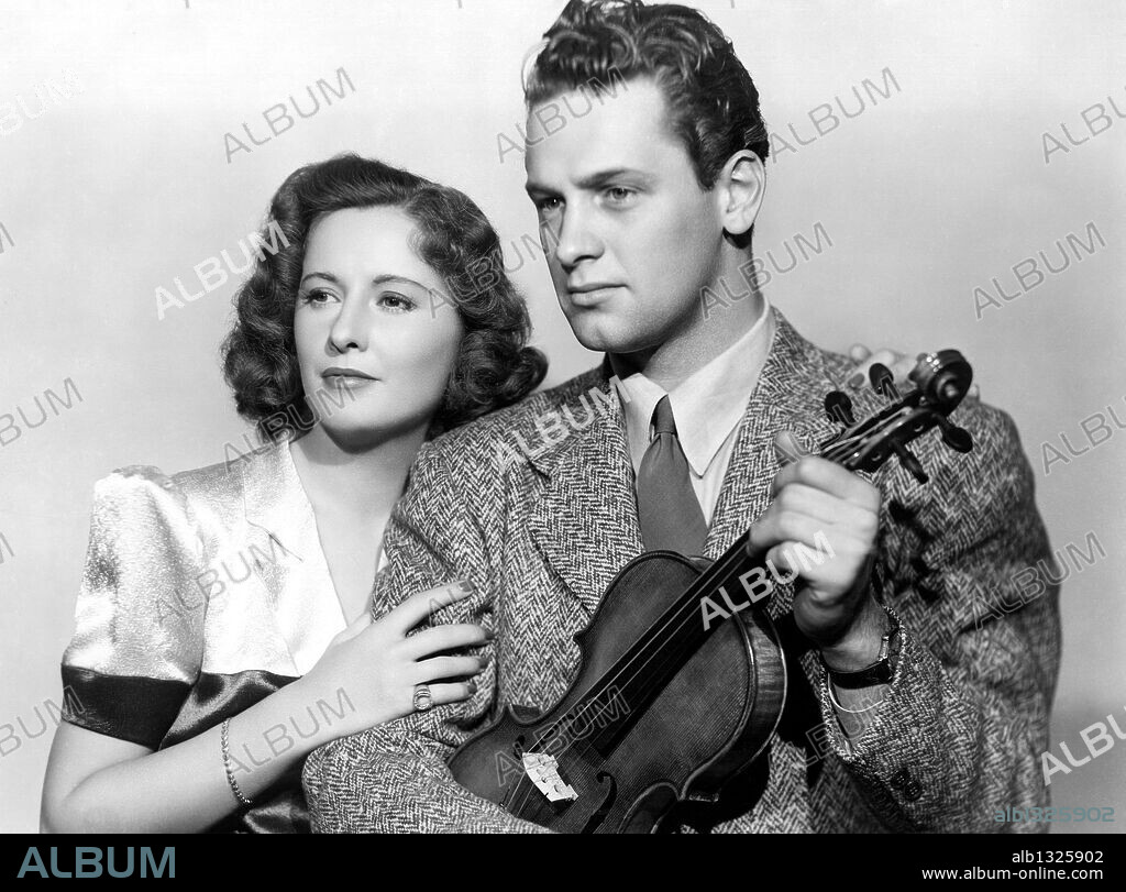 BARBARA STANWYCK and WILLIAM HOLDEN in GOLDEN BOY, 1939, directed by ROUBEN MAMOULIAN. Copyright COLUMBIA PICTURES.