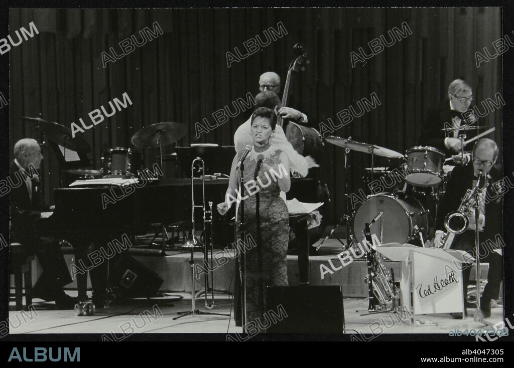 The Ted Heath Orchestra performing live, London, 1985. Pictured are Norman Stenfalt (piano), Lita Roza (vocals), Lennie Bush (double bass) and Jack Parnell (drums).