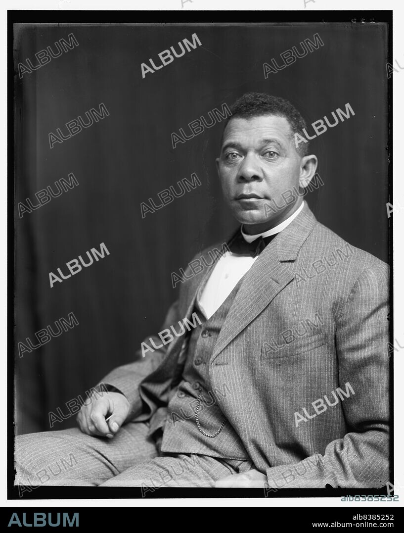 FRANCES BENJAMIN JOHNSTON. Booker T. Washington, half-length portrait, seated, c1895.