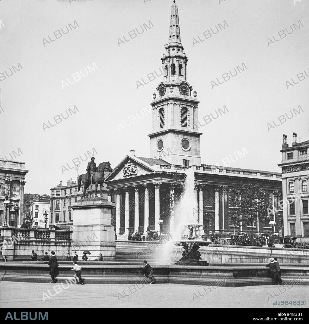 Magic Lantern Slide Circa 1900.victorian.fountain In Trafalgar Square Showing Equestrian Statue Of Charles I And St Martin-In-The-Fields, London, England, United Kingdom.children Playign Around Fountain.
