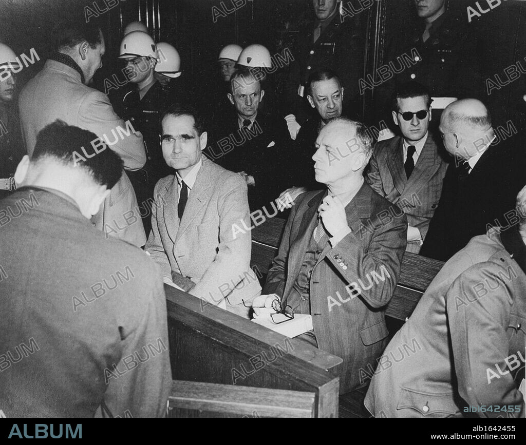 Rudolf Hess (1894-1987) prominent figure in Nazi Germany, acting as Adolf Hitler's deputy in the Nazi Party from 1926-41. Hess (centre in pale jacket) at the War Crimes Trials in Nuremberg, 1946.