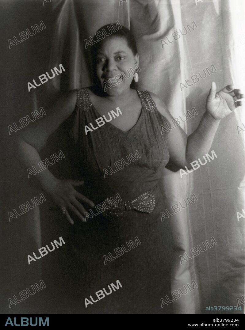 Bessie Smith holding feathers photographed by Carl Van Vechten, February 3, 1936. Bessie Smith (1894-1937) was an American blues singer nicknamed The Empress of the Blues, Smith was the most popular female blues singer of the 1920s and 1930s. She is often regarded as one of the greatest singers of her era and a major influence on subsequent jazz vocalists. In the 1920's Smith became the highest paid black entertainer of the day, heading her own shows, which sometimes featured as many as 40 troupers, and touring in her own railroad car. Smith's career was cut short by a combination of the Great Depression and the advent of Hollywood "talkies", which spelled the end for vaudeville. In 1937 Smith was critically injured in a car accident while traveling along U.S. Route 61. Smith's funeral was held in Philadelphia and an estimated 10,000 mourners who filed past her coffin.