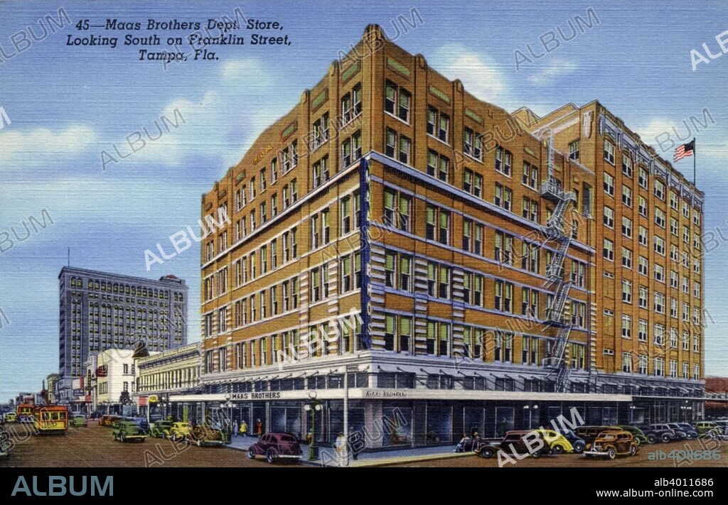 Maas Brothers department store, Tampa, Florida, USA, 1940. Postcard. View looking south with pedestrians, cars and streetcars on Franklin Street. Brothers Abe and Isaac Maas opened their first department store in Tampa in 1886. The business expanded until it consisted of 39 stores across Florida. The store in downtown Tampa closed in 1991 and was demolished in 2006.
