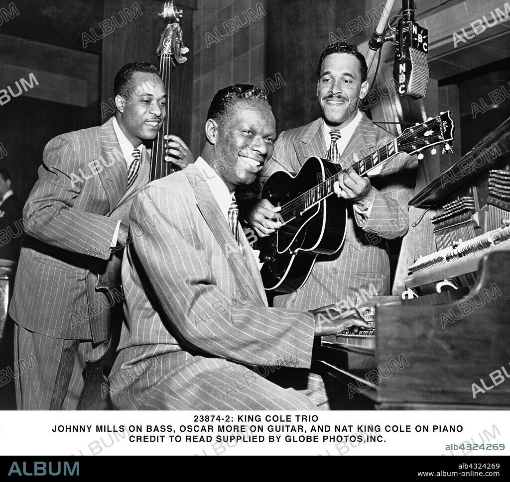 23874-2: KING COLE TRIO .JOHNNY MILLS ON BASS, OSCAR MORE ON GUITAR, AND NAT KING COLE ON PIANO.CREDIT TO READ SUPPLIED BY (Credit Image: © Globe Photos/ZUMAPRESS.com). 2011