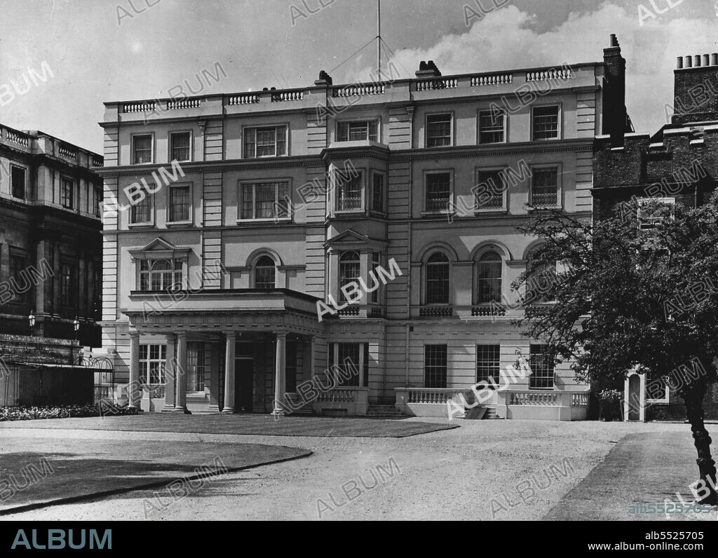 The Garden Front -- The two bays above the portico represent the south end of the house built in 1826-27 for the Duke of Clarence by Nash. The portion to the right of the portico was added by the Duke of Edinburgh in 1875, when the whole was refaced and heightened. June 4, 1953.