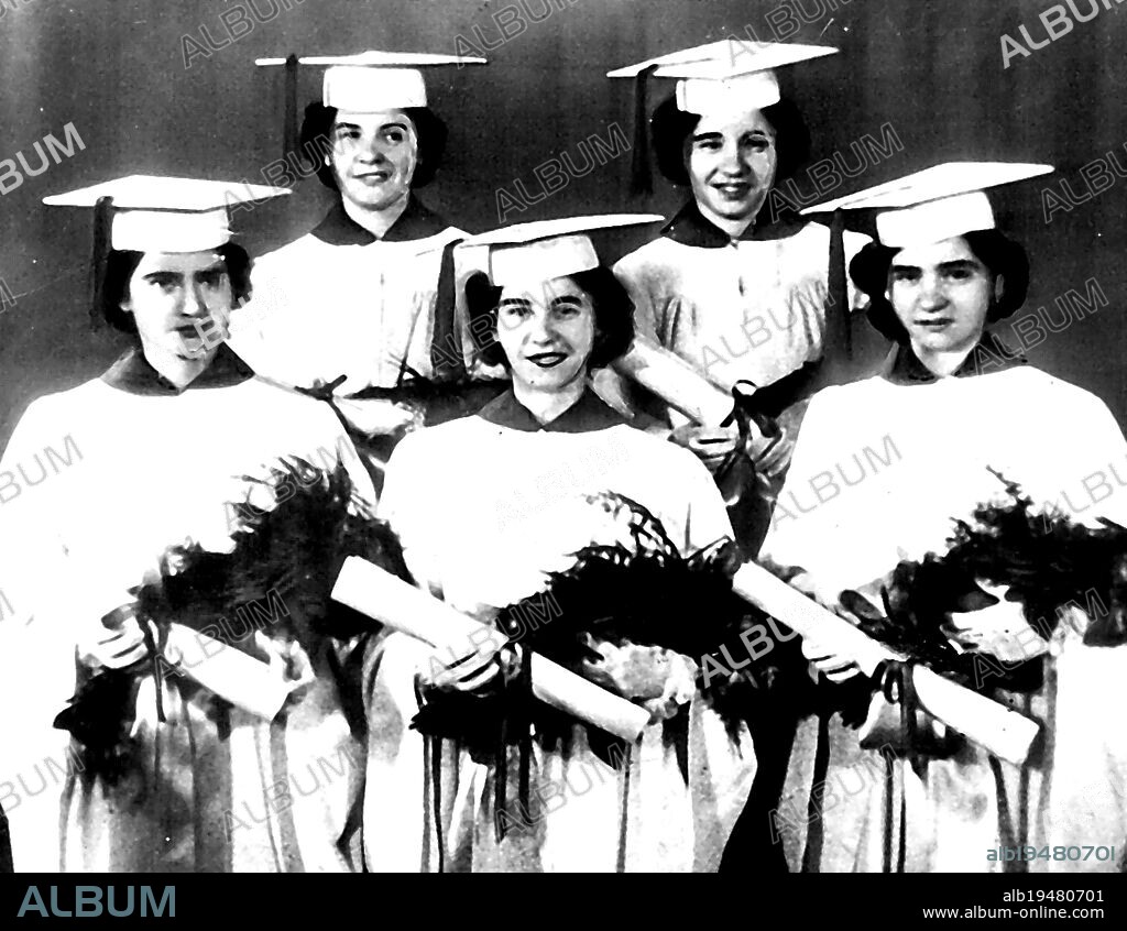 Dionne Quints Graduate -- The Dionne quintuplets pose for graduation picture May 28 on their 18th birthday anniversary after receiving Diplomas from private high school Villa Notre Dame at Corbiel, Ontario. They will continue their education at a girls' boarding school in Quebec. Left to right are Annette, Ceile, Marie, Emily and Yvonne. June 03, 1952. (Photo by AP Wirephoto).