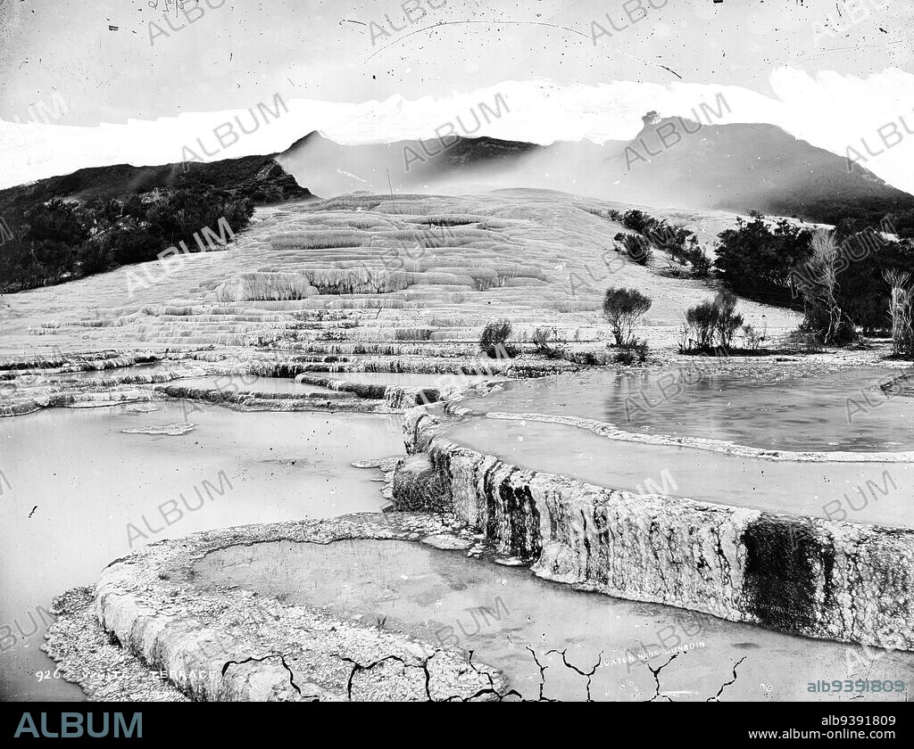 White Terrace, Burton Brothers studio, photography studio, circa 1885, Dunedin, wet collodion process, View of the white terraces at Rotomahana. There is steam rising from the top of the terrace.
