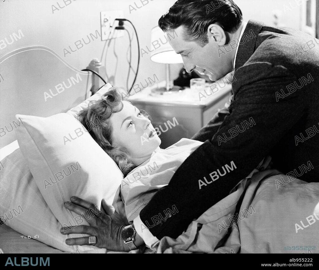 GLORIA GRAHAME and MELVYN DOUGLAS in A WOMAN'S SECRET, 1949, directed by NICHOLAS RAY. Copyright RKO RADIO.