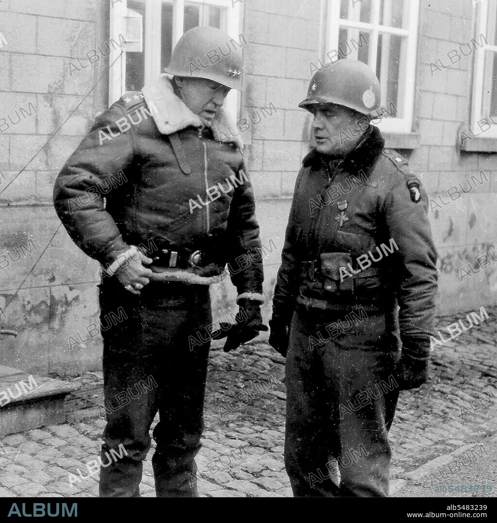 General George S. Patton (George Patton) speaks to General Anthony McAuliffe in France circa 1945.