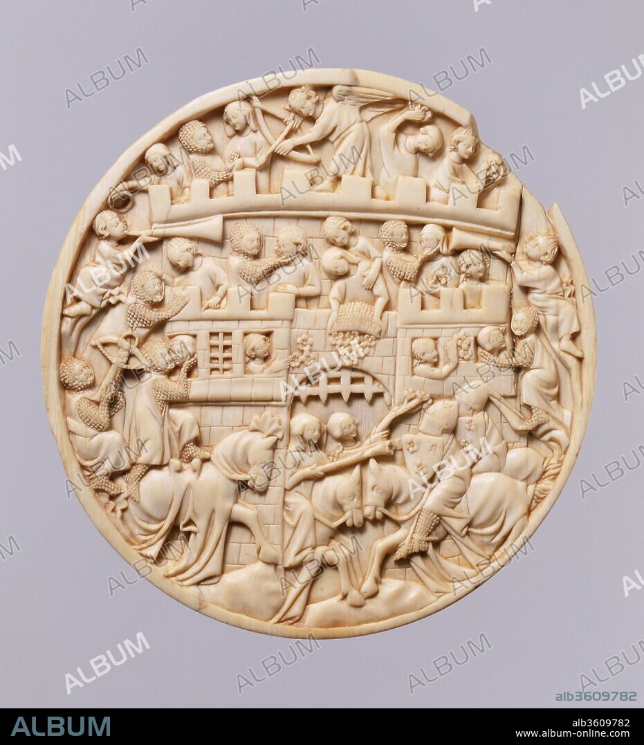 Roundel with Scenes of the Attack on the Castle of Love. Culture: French. Dimensions: Overall: Diam. 5 9/16 x 1/2 in. (Diam. 14.1 x 1.2 cm). Date: ca. 1320-40.
The attack on the Castle of Love became a popular image in the fourteenth century and is represented here with particular delicacy. Twenty- eight figures and five horses occupy the ground in front of the castle, as well as its battlements and windows. At the top the crowned and winged god of love prepares to launch an arrow toward the lower left. The castle is defended by women armed with roses that they hurl at the attacking knights. The knights are greeted by some women with welcoming gestures; and, in the upper left, a woman offers a crown to one of the trumpeters, who will announce the playful joust to take place before the portcullis. 
Two armed knights, their shields decorated with roses, ride in from the right to face their female opponents. A third, who has lost his shield and removed his helmet, stands on his horse to embrace a woman in a window to the left of the castle entrance. 
The ivory disk is the size and shape of fourteenth- century mirror cases, some of which are decorated with the same theme; but the reverse is, uncharacteristically, threaded at the edge, suggesting that the disk may have been the cover of a circular box.