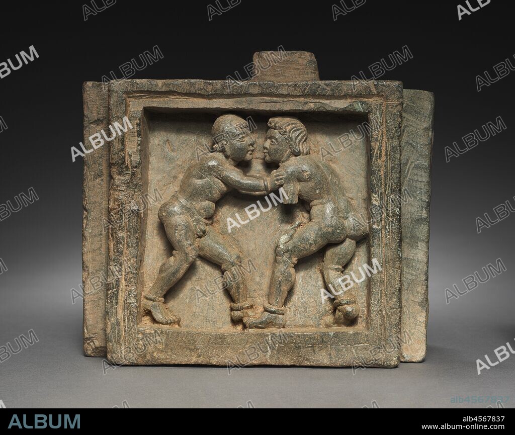 Architectural Bracket with Wrestlers, 100s-200s. This sculpture probably derived from Greco-Roman prototypes of nude athletes, but here it has probably been transposed into a scene from the boyhood of the Buddha, when it is said that he excelled in all forms of athletics.