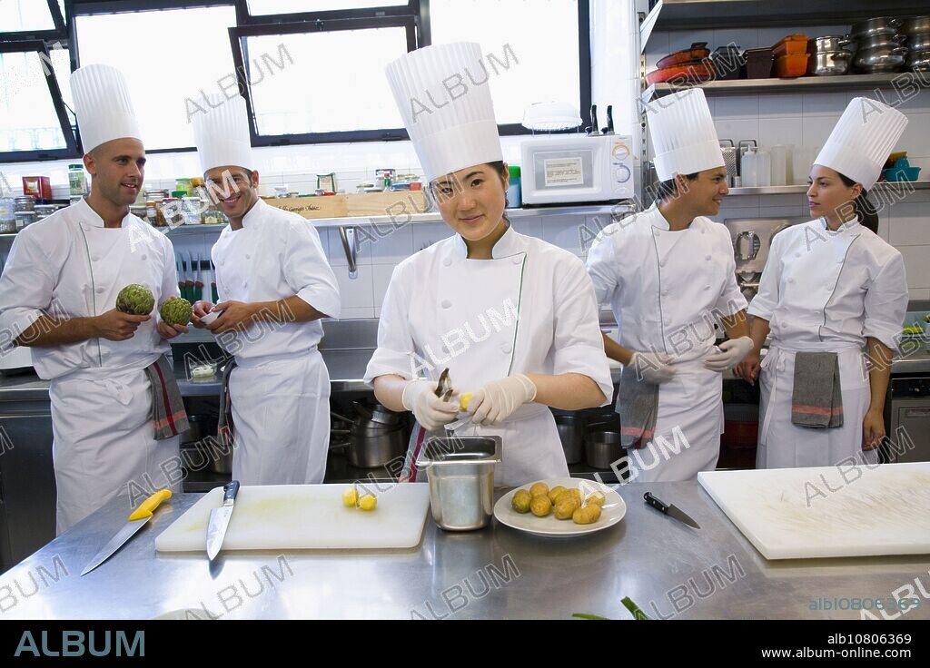 Peeling potatoes, artichokes. Luis Irizar cooking school. Donostia, Gipuzkoa, Basque Country, Spain.