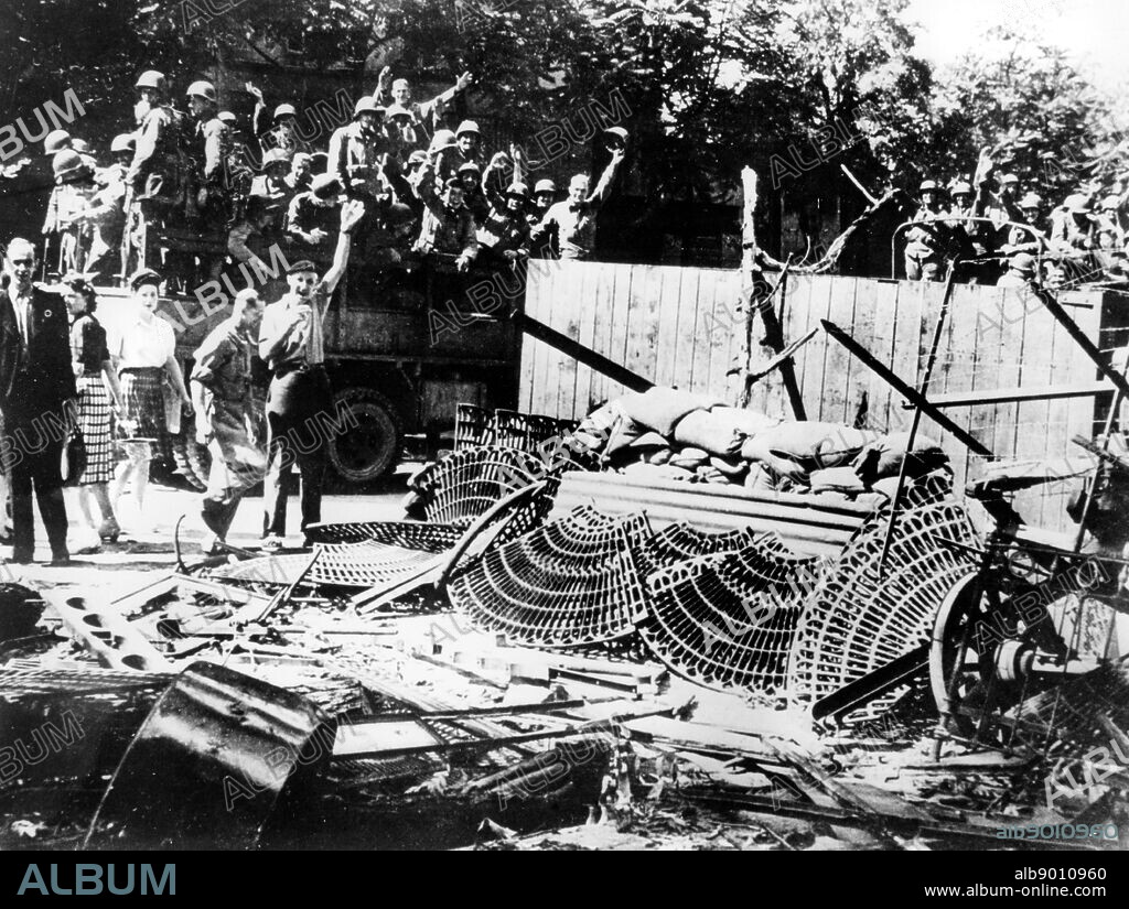 Barricades erected near the Place de la Concorde, Paris, August 1944. As Allied forces neared Paris, the city's citizens mobilised to help bring the Nazi occupation to a close. A general strike was called on 18 August, barricades were erected and skirmishes with German troops broke out. By the time the Germans surrendered after Free French troops entered the city on 25 August, 1500 civilians and members of the Resistance had been killed in the fighting. The photographer is unknown.
