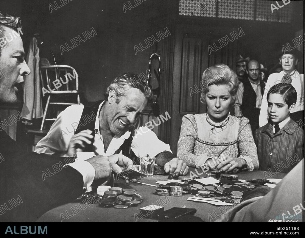 JASON ROBARDS and JOANNE WOODWARD in A BIG HAND FOR THE LITTLE LADY, 1966, directed by FIELDER COOK and PAUL NEWMAN. Copyright WARNER BROTHERS.