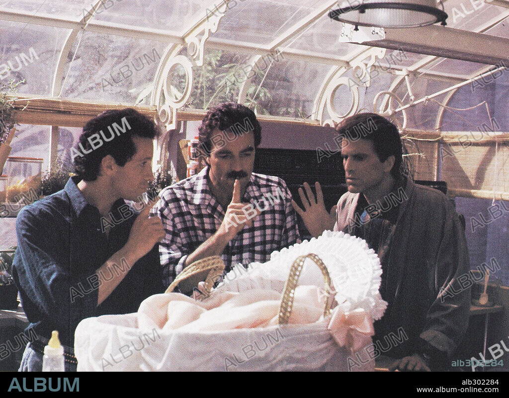 STEVE GUTTENBERG, TED DANSON and TOM SELLECK in THREE MEN AND A BABY, 1987, directed by LEONARD NIMOY. Copyright TOUCHSTONE PICTURES.