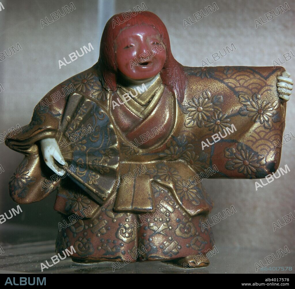 Japanese Netsuke of a No dancer as a Shojo or drunken sprite, signed Masahira. from the V&A's collection.