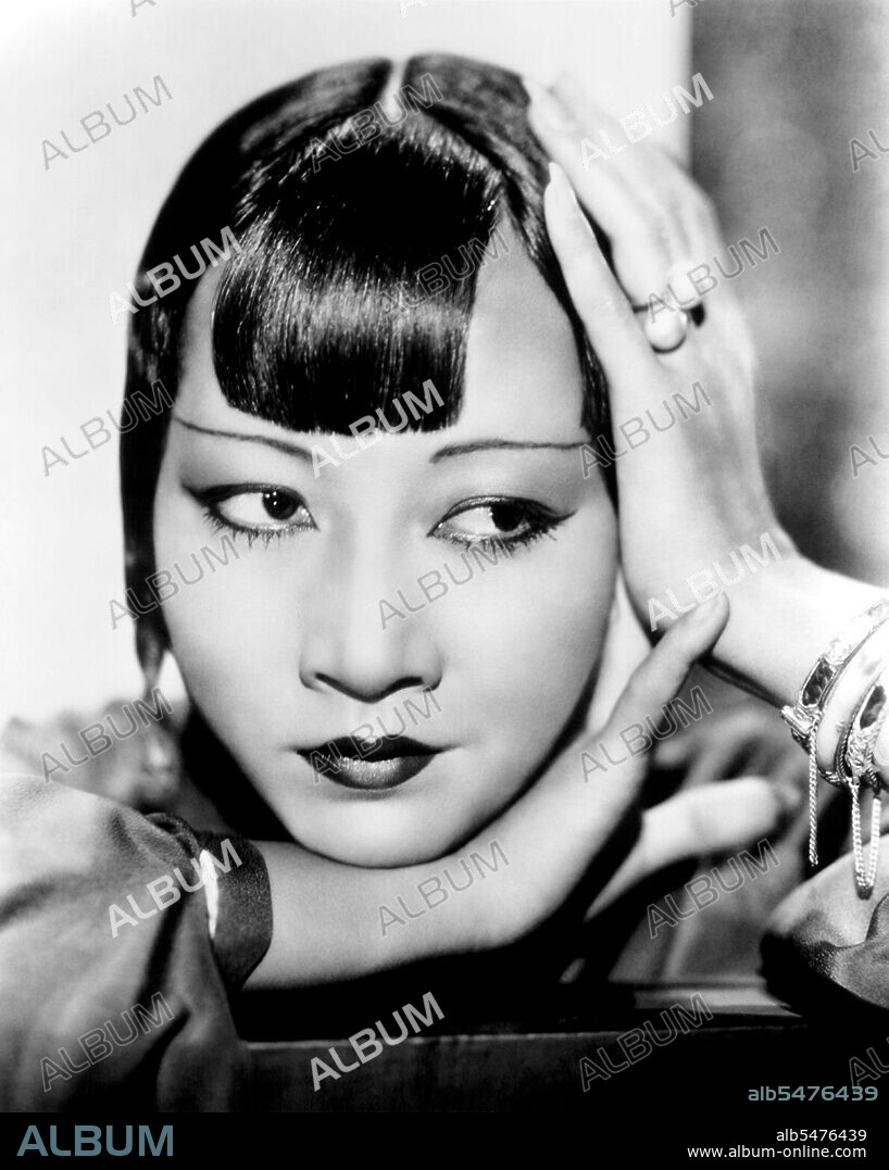 Anna May Wong (January 3, 1905 February 3, 1961) was an American actress, the first Chinese American movie star, and the first Asian American to become an international star. Her long and varied career spanned both silent and sound film, television, stage, and radio. Born near the Chinatown neighborhood of Los Angeles to second-generation Chinese-American parents, Wong became infatuated with the movies and began acting in films at an early age. During the silent film era, she acted in The Toll of the Sea (1922), one of the first movies made in color and Douglas Fairbanks' The Thief of Bagdad (1924). Wong became a fashion icon, and by 1924 had achieved international stardom. Frustrated by the stereotypical supporting roles she reluctantly played in Hollywood, she left for Europe in the late 1920s, where she starred in several notable plays and films, among them Piccadilly (1929). She spent the first half of the 1930s traveling between the United States and Europe for film and stage work. Wong was featured in films of the early sound era, such as Daughter of the Dragon (1931) and Daughter of Shanghai (1937), and with Marlene Dietrich in Josef von Sternberg's Shanghai Express (1932). In 1935 Wong was dealt the most severe disappointment of her career, when Metro-Goldwyn-Mayer refused to consider her for the leading role in its film version of Pearl S. Buck's The Good Earth, choosing instead the German actress Luise Rainer to play the leading role. Wong spent the next year touring China, visiting her family's ancestral village and studying Chinese culture. In the late 1930s, she starred in several B movies for Paramount Pictures, portraying Chinese-Americans in a positive light. She paid less attention to her film career during World War II, when she devoted her time and money to helping the Chinese cause against Japan. Wong returned to the public eye in the 1950s in several television appearances as well as her own series in 1951, The Gallery of Madame Liu-Tsong, the first U.S. television show starring an Asian-American. She had been planning to return to film in Flower Drum Song when she died in 1961, at the age of 56.