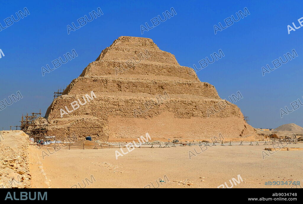 Step Pyramid of Djoser, at Saqqara, Egypt. Saqqara was an ancient burial ground in Egypt, serving as the necropolis for the Ancient Egyptian capital, Memphis. Djoser was the first or second king of the 3rd Dynasty (ca. 2667 to 2648 BC) of the Egyptian Old Kingdom (ca. 2686 to 2125 BC).