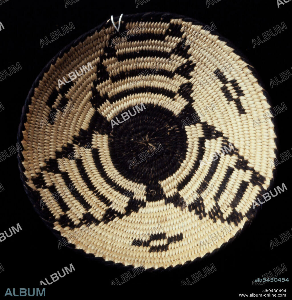 Miniature Basket, 1900-1942, 1 x 1 x 1 in. (2.5 x 2.5 x 2.5 cm), Plant fibers, United States, 20th century, In the early 1900s, many Euro-American women traveling through the Southwest region of the United States became infatuated with miniature Native American baskets, and some became avid collectors. Native women basket makers responded to this demand by creating ever-smaller baskets, utilizing the same harvesting, processing, and coiling techniques as those for personal use. Creating tightly woven, tiny baskets in an expanding range of designs and styles for their new clientele required the same levels of expertise and knowledgebut perhaps even more dexterity and skill.