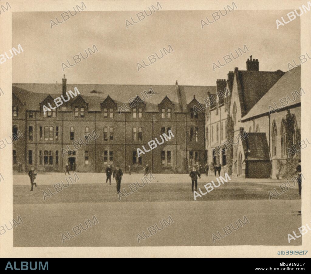 'Rossall School', 1923. Rossall School, fee paying private school in Fleetwood, Lancashire founded in 1844 by St. Vincent Beechey and qualified under the Royal Charter in 1890. From Sunripe Cigarettes - A Series of 50 Public Schools and Colleges. [R. & J. Hill Ltd., London, 1923].