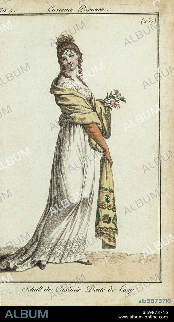 Fashionable woman wearing a cashere shawl, 1800. Her embroidered shawl is of light cashmere wool, and her dress is decorated with lace. Schall de Casimir. Dents de Loup. Handcoloured copperplate engraving from Pierre de la Mesangeres Journal des Modes et Dames, Paris, 1800. The illustrations in volume 4 were by Carle Vernet, Bosio, Dutailly and Philibert Louis Debucourt.