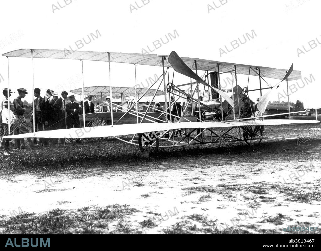 The Wright Flyer on display at Fort Myer, Virginia on September 3, 1908. In January 1907 the Wright Brothers submitted a bid to the U.S. War Department to design a plane for $25,000. This bid came as a response to a War Department request issued a month earlier for a "Heavier-than-air Flying Machine." While Wilbur Wright went off to Paris to promote the Wright Flyer, Orville Wright stayed in Dayton, Ohio to design a plane for the Army Signal Corps. By August Orville's plane was ready and he headed to Fort Myer, Virginia, where the air trials were to ta]ke place. From August 20, 1908, to September 17, 1908, Orville performed test flights for the Army. On September 17th a split propeller caused the plane to crash, injuring Orville and killing his passenger, Lieutenant Thomas Selfridge. In spite of the crash the Army believed that the Wright plane would work. In July 1909, when Orville was able to fly again, he completed the test flights and surpassed all of the Army's requirements for a military plane: to carry a passenger for at least 125 miles at a speed of 40 miles per hour and stay aloft for at least one hour, easily transportable, controllable and steerable at all times and in all directions, and land without damage. On August 2, 1909, the Signal Corps accepted the Wright Flyer as the world's first military aircraft, naming it Signal Corps Airplane No. 1.