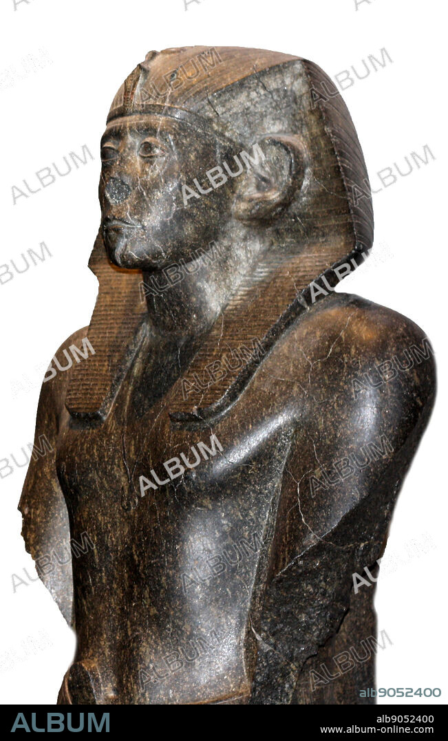 Black granite statues of Pharaoh Sesostris III. 12th dynasty, circa 1850 BC. Originally from Deir el-Bahri, now at the British Museum.