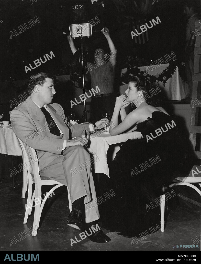 GEORGE STEVENS and KATHARINE HEPBURN in WOMAN OF THE YEAR, 1942, directed by GEORGE STEVENS. Copyright M.G.M.