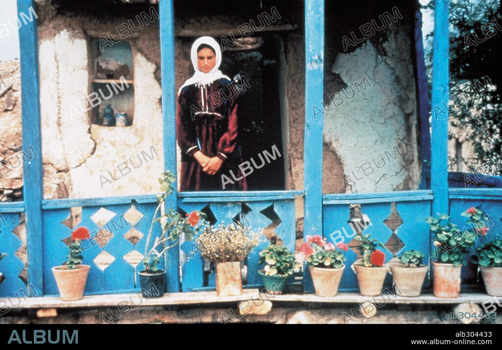 THROUGH THE OLIVE TREES, 1994 (ZIRE DARAKHATAN ZEYTON), directed by ABBAS KIAROSTAMI.