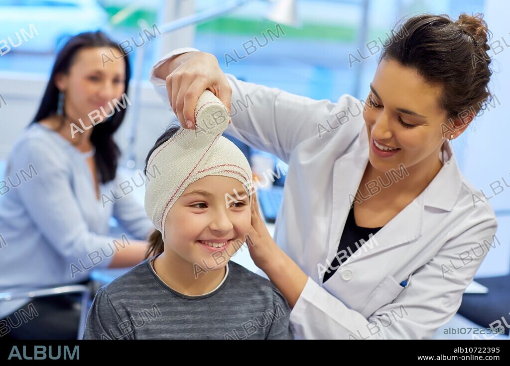 Otoplasty. winged ears. Malformation there is an absence antehelix crease. Otoplasty involves molding the ear cartilage to create a new fold. Doctor attending to patient medical consultation. Office. Plastic surgery. Pediatrician.