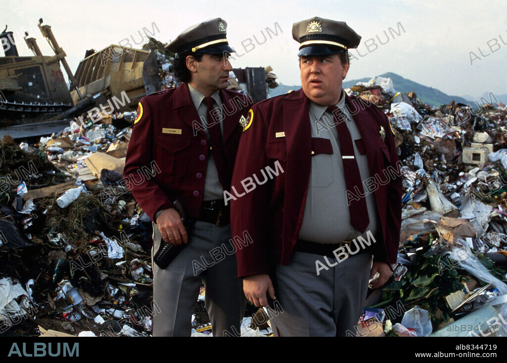 EUGENE LEVY and JOHN CANDY in ARMED AND DANGEROUS, 1986, directed by MARK L. LESTER. Copyright COLUMBIA PICTURES.