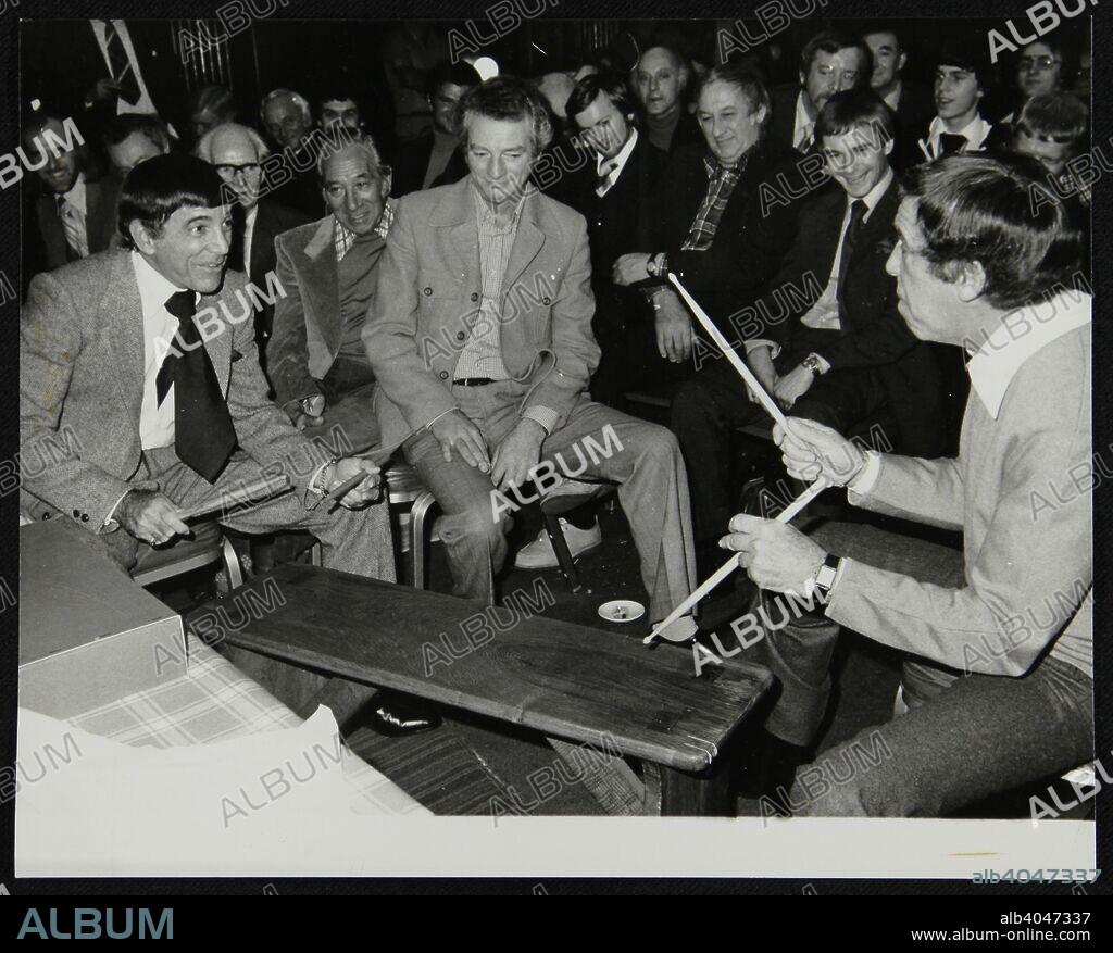 Louie Bellson and Buddy Rich at the International Drummers' Association meeting at the Horseshoe pub, Tottenham Court Road, London, 1 November 1978. Other drummers present include Joe Daniels, Allan Ganley, Tony Kinsey, Tony Crombie and Derek Hogg.