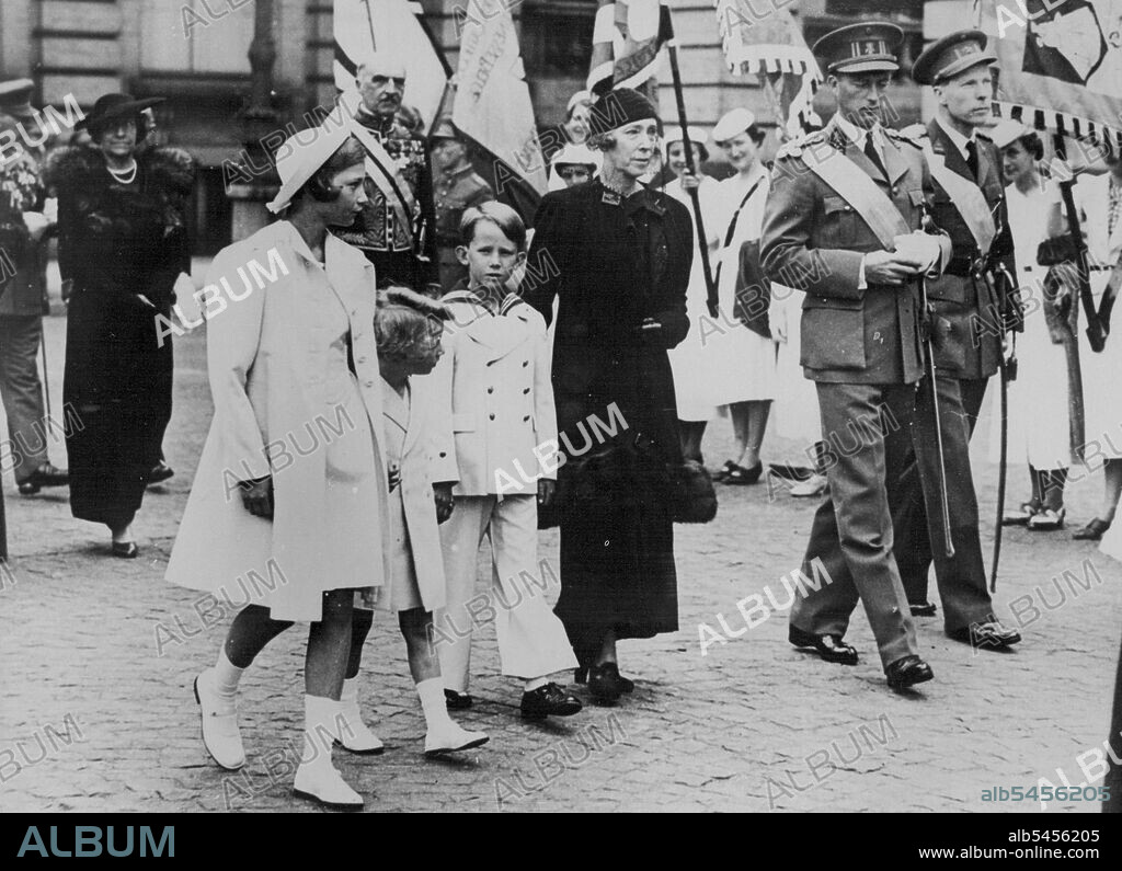Royal Family Attend National Fete In Brussels. (L to R) Princess Josephine Charlotte; Prince Albert of Liege; crown Prince Baudouin; Queen Elizabeth; King Leopold and Prince Charles arriving or the open Air Mass.King Leopold of the Belgians with his children, his brother, and the Queen Mother attended the National Festival in Brussels today. They were present at the Te Deum Which was sung in the open on the place Royale. July 21, 1938. (Photo by Keystone).