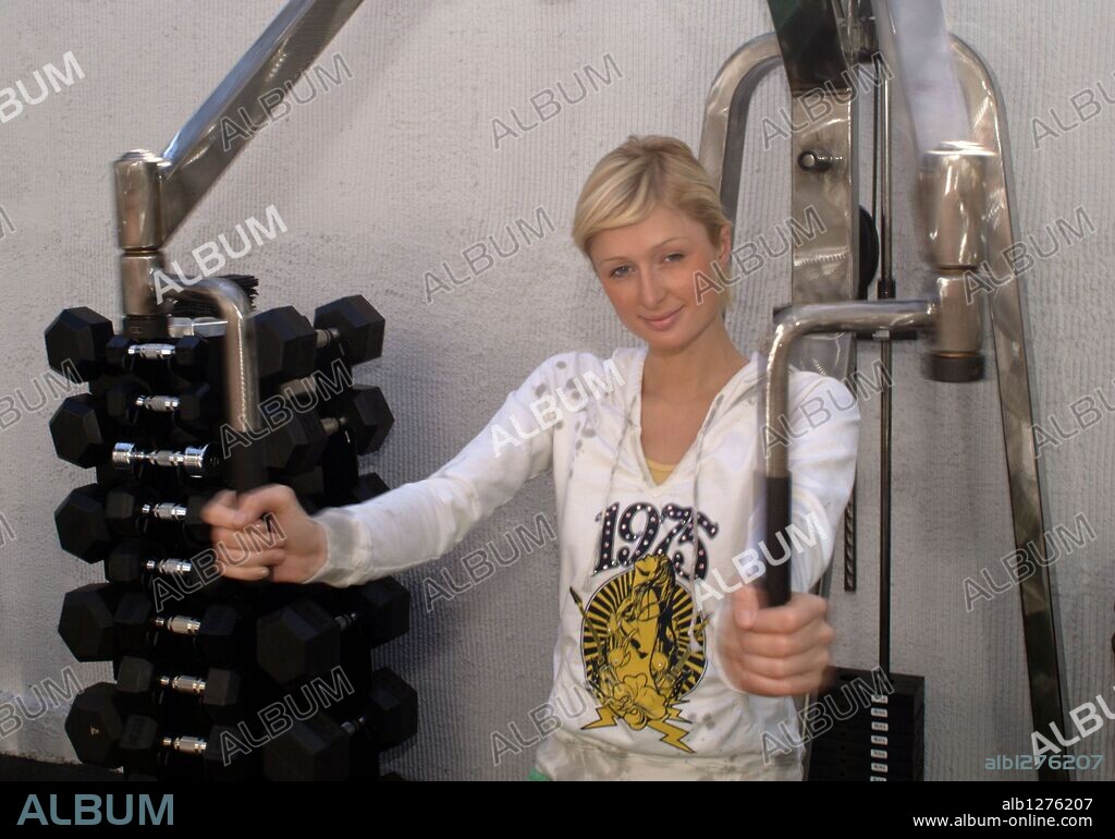 PARIS HILTON. Feb 21, 2006; West Hollywood, CA, USA; EXCLUSIVE!! Socialite PARIS HILTON works out at The Gym in West Hollywood, Calif. Her typical workout is 30 minutes of cardio, followed by lifting 5-lb. free weights with a ste-up move. She does chest presses with 10-lb. weights and squats with 15-lb. weights. Her favorite workout is running and Pilates. Her least favorite is sit-ups and push-ups. Mandatory Credit: Photo by Olivier Pojzman/ZUMA Press. (©) Copyright 2006 by Olivier Pojzman. 21/02/2006