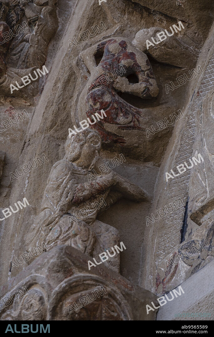 North Romanesque portal, musician playing alborgue, Church of El Salvador, Romanesque from the 13th century, Ejea de los Caballeros, Cinco Villas, Aragon, Spain.