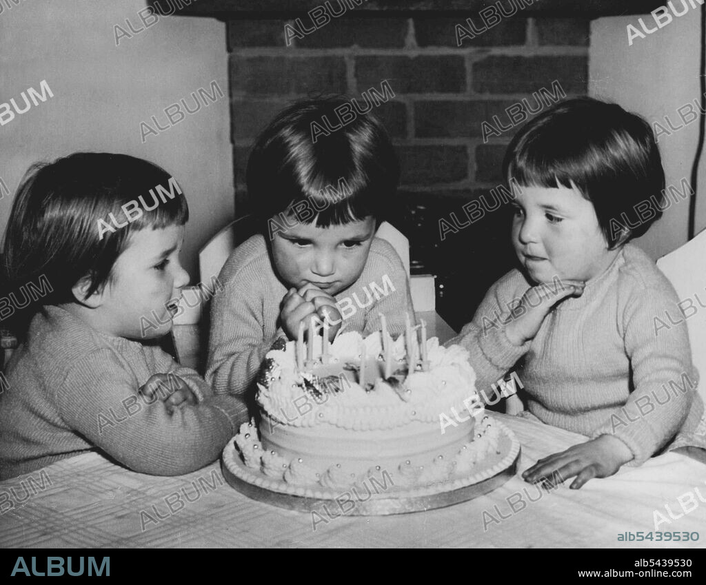 Big Blow. Three sets of three candles solved triplets birthday problem. Lynette (left), Annette and Jeanette Bishop of Brussels St. Mascot who are three years old today had a prebirthday blow before they went to bed last night.The Bishop triplets Annette, Jeanette and Lynette blow out their joint birthday cake. August 05, 1951.