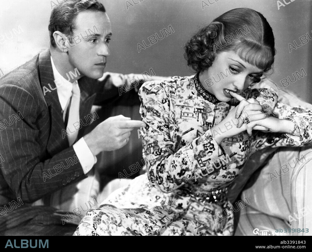 BETTE DAVIS und LESLIE HOWARD in IT'S LOVE I'M AFTER, 1937, unter der Regie von ARCHIE MAYO. Copyright WARNER BROS PICTURES.