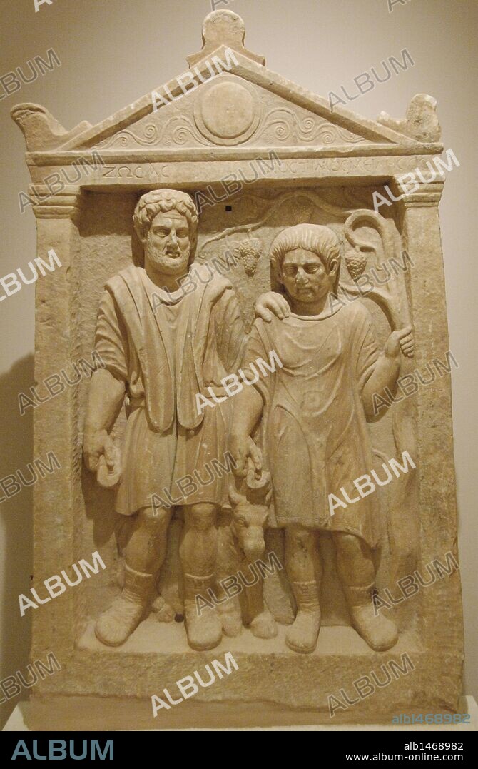 Gravestone of the farmers Sosas and Nostimos the Miletian. 2nd century AD. Archaeological Museum of Marathon. Greece.