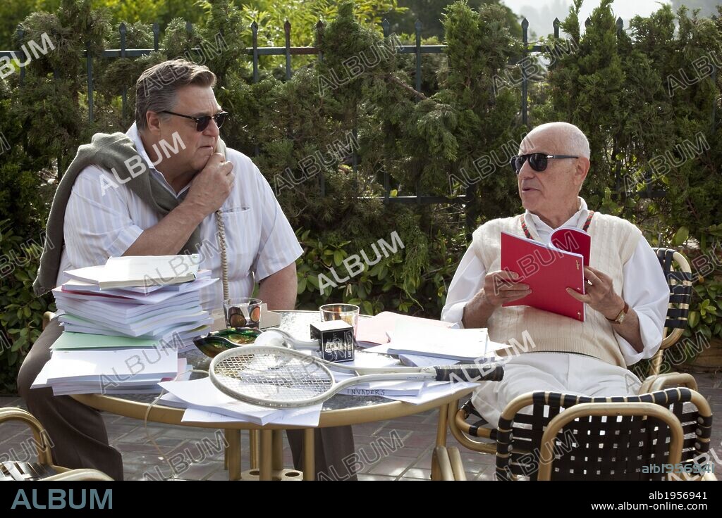 ALAN ARKIN and JOHN GOODMAN in ARGO, 2012, directed by BEN AFFLECK. Copyright WARNER BROS. PICTURES.
