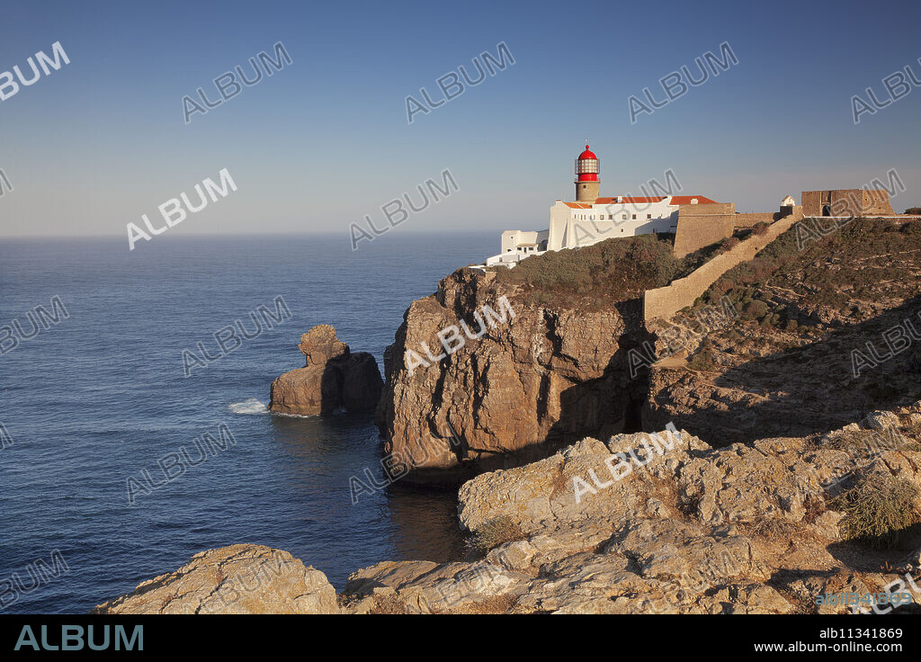 Lighthouse at sunrise, Cabo de Sao Vicente, Sagres, Algarve, Portugal, Europe.