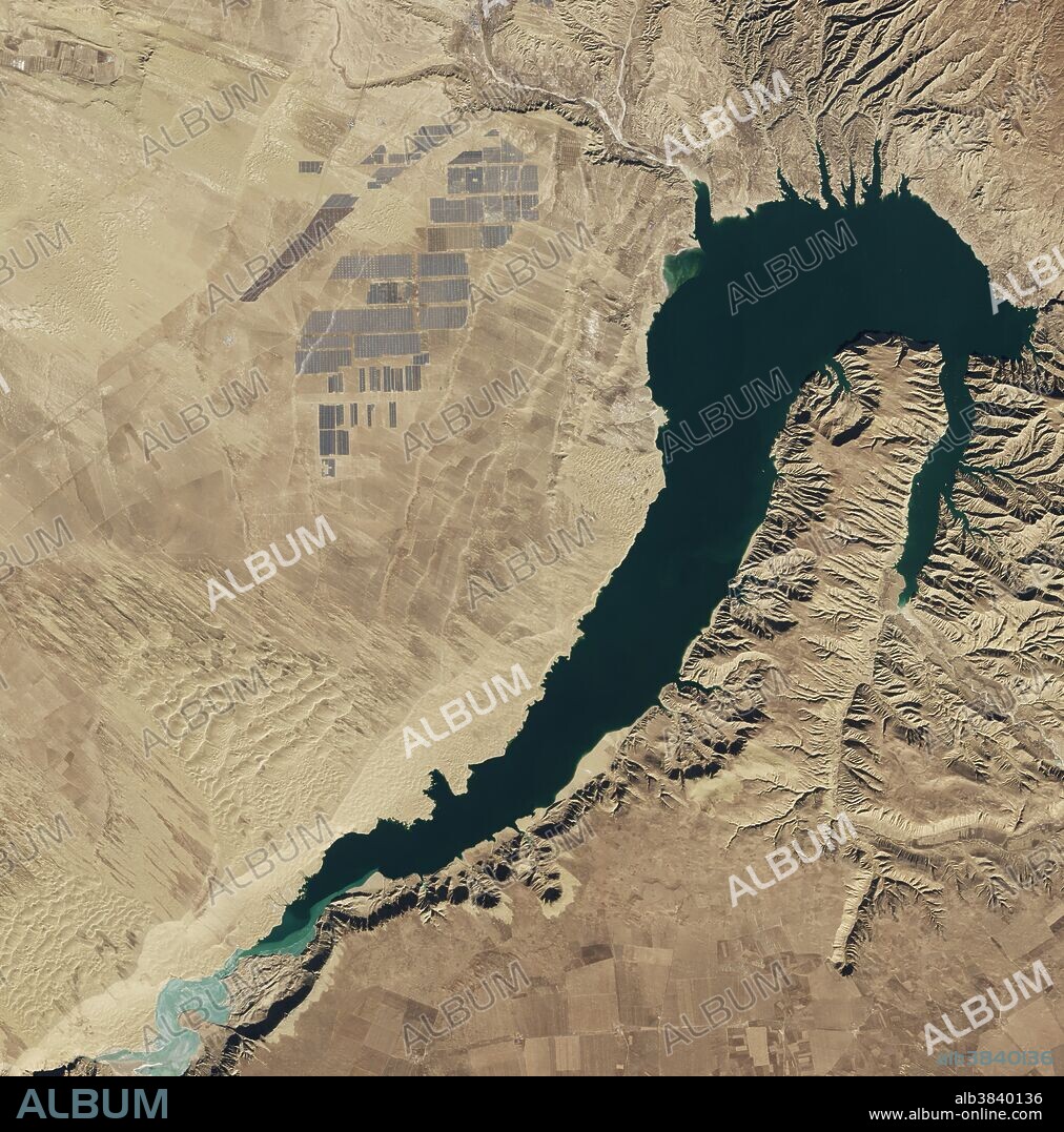 Longyangxia Dam Solar Park in China, the largest solar farm in the world as of February 2017, captured by the Operational Land Imager (OLI) on Landsat 8. Water in the dam's reservoir is used for irrigation and hydroelectric power.