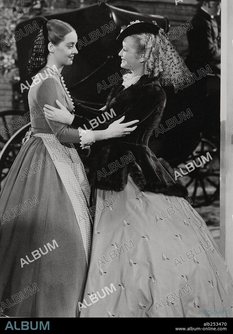 BETTE DAVIS and MIRIAM HOPKINS in THE OLD MAID, 1939, directed by EDMUND GOULDING. Copyright WARNER BROTHERS.