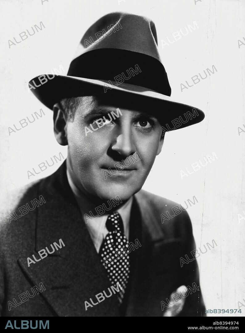 "Wake Up And Live" with Walter Winchell, Ben Bernie, Alice Faye, Patsy Kelly, Ned Sparks, Jack haley, Grace Bradley, Walter Catlett, Leah Ray, Joan Davis, Douglas Fowley, Miles Mander. Highest paid journalist-radio gossip in America, Walter Winchell is now a movie star. Australian film fans will be introduced to him next Friday at Hoyts Regent Theatre IN" Wake Up and Live". September 19, 1937. (Photo by A Twentieth Century Fox).