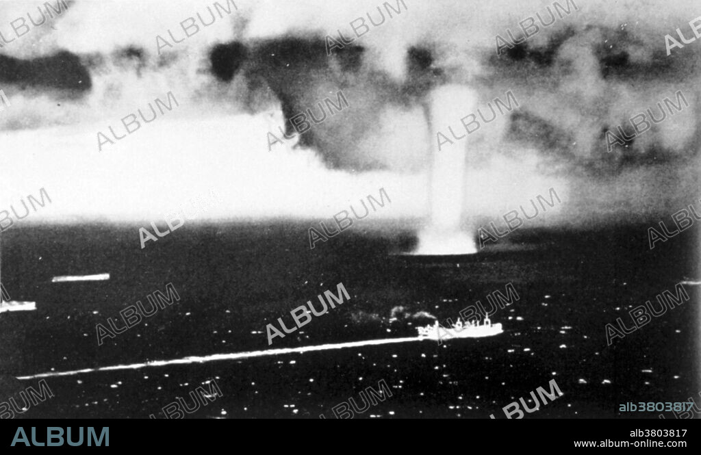 Huge waterspout observed from aircraft accompanying North Atlantic convoy during WWII. No date given. A waterspout is a tornado occurring over water that forms a column of water and mist extending between the surface and the clouds above. Waterspouts have a five-part life cycle: formation of a dark spot on the water surface, spiral pattern on the water surface, formation of a spray ring, development of the visible condensation funnel, and ultimately decay.