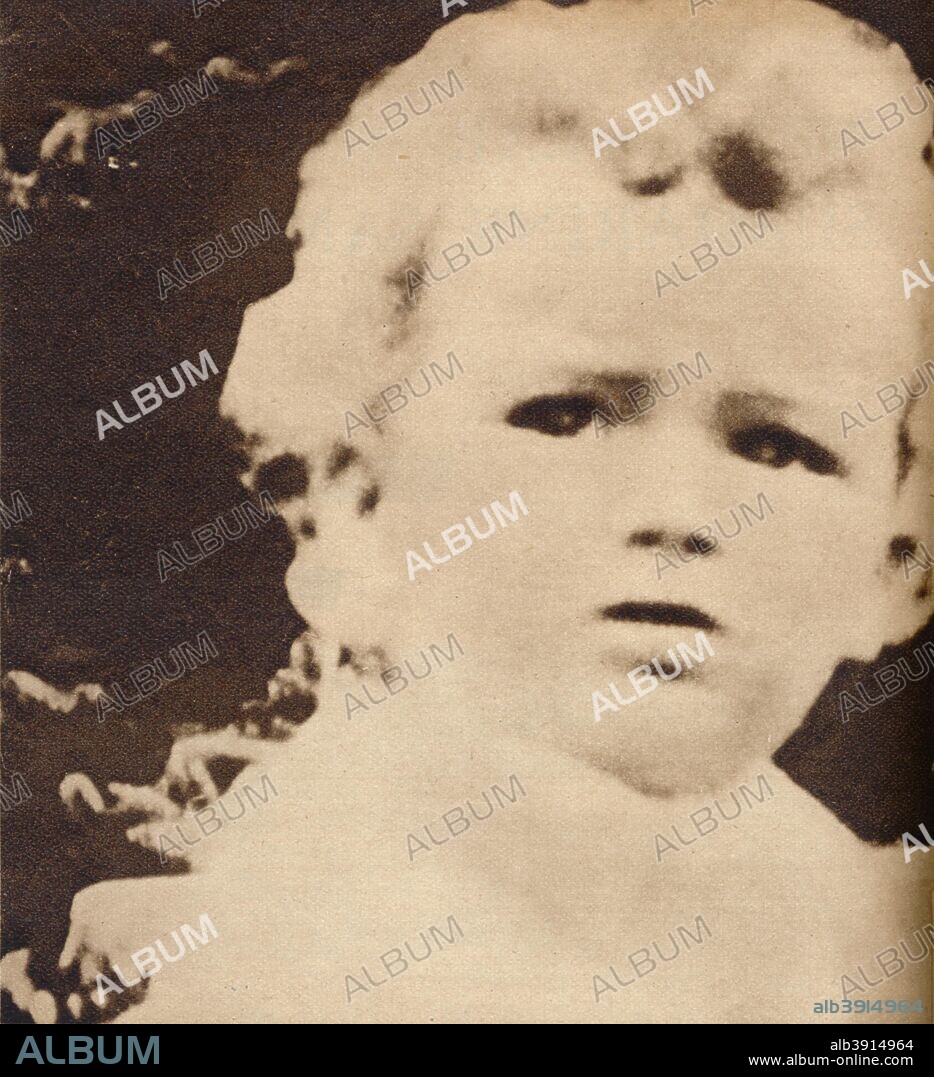 'Lindbergh Baby', 1932, (1938). The kidnapping of Charles Augustus Lindbergh, Jr, the eldest son of aviator Charles Lindbergh and Anne Morrow Lindbergh, was one of the most highly publicised crimes of the 20th century. The 20 month old toddler was abducted from his family home, Highfields, New Jersey, on the evening of March 1, 1932. The crime prompted Congress to pass the Federal Kidnapping Act, commonly called the ?Lindbergh Law?, which made transporting a kidnapping victim across state lines a federal crime. From These Tremendous Years 1919-1938. [Daily Express, London, 1938].