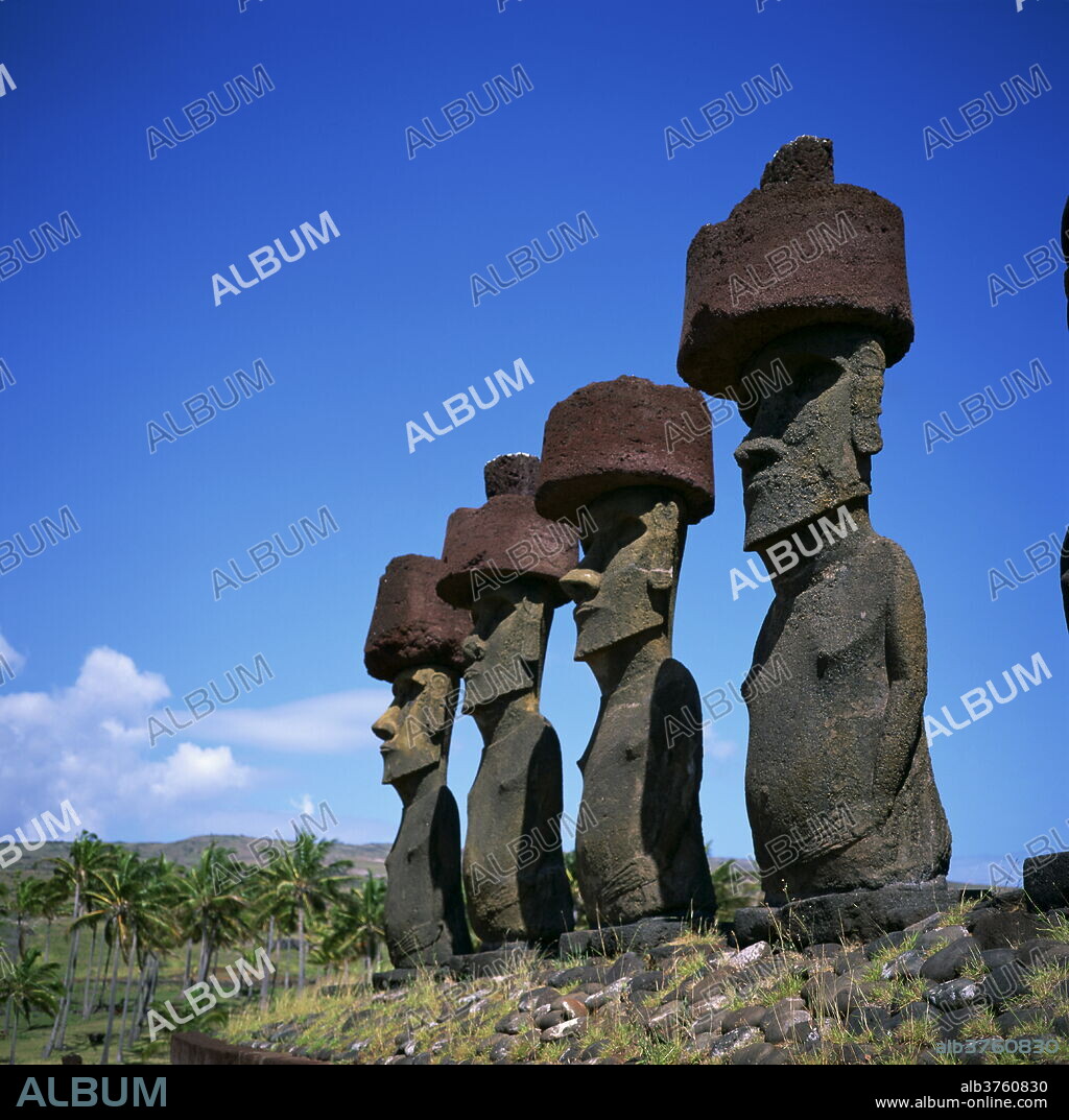 A line of moai statues, Ahu Nau Nau at Anakenu on Easter Island (Rapa Nui), UNESCO World Heritage Site, Chile, South America.